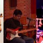 Músicos tocando violino, guitarra e fones de ouvido em um projeto de trilhas sonoras em Manaus.