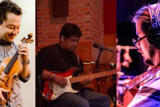 Músicos tocando violino, guitarra e fones de ouvido em um projeto de trilhas sonoras em Manaus.