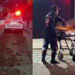 Socorristas atendem vítima em Manaus após agressão, com ambulância no local