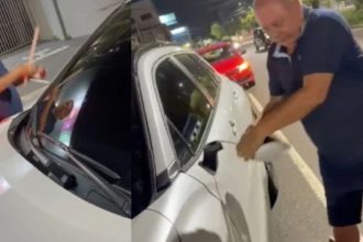 Advogado é flagrado quebrando carro de mulher após acidente em Manaus