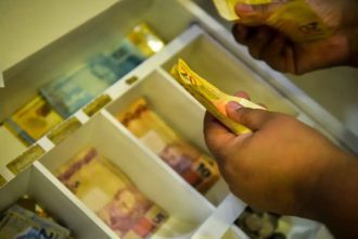 Caixa libera valores do FGTS retidos para trabalhadores do saque-aniversário