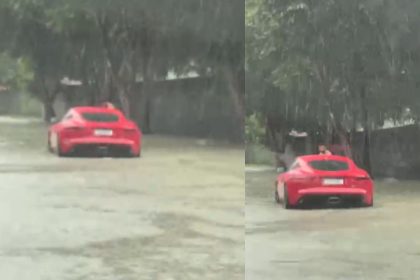 Chuva forte deixa carro de luxo parado em trecho alagado no bairro Tarumã