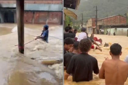 Vídeo mostra moradores utilizando cordas para não serem levados por enxurrada