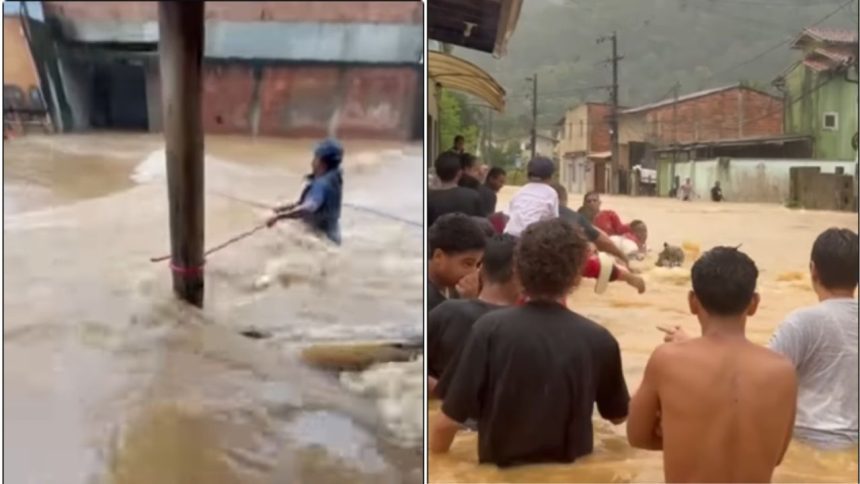 Vídeo mostra moradores utilizando cordas para não serem levados por enxurrada