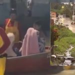 Chuva alaga Manaus e bombeiros usam botes para resgatar famílias