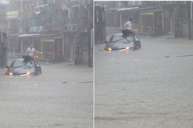 Motorista fica ilhado e sobe em veículo durante alagamento na zona sul de Manaus