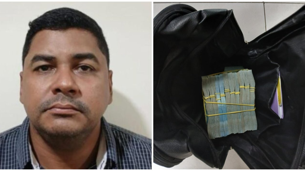 Policial Militar do Amazonas ao lado de mala preta aberta com maços de dinheiro amarrados.