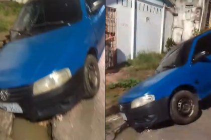 Carro fica preso em buraco após acidente no bairro Compensa 2
